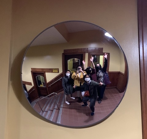 Me taking a photo in the mirror with my friends